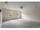 Expansive bedroom with soft gray carpeting, providing a comfortable and inviting space at 2912 Vinings Forest Se Way, Atlanta, GA 30339