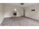 Bright bedroom featuring plush carpet, access to a bathroom, and a pre-installed TV mount at 2912 Vinings Forest Se Way, Atlanta, GA 30339