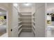 Organized walk-in pantry with ample shelving for storage and organization at 2912 Vinings Forest Se Way, Atlanta, GA 30339