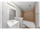 Bathroom features shower and tub combo with tile surround and updated vanity at 6350 Mozart Dr, Riverdale, GA 30296