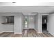 Bright living area features sleek flooring and a freshly painted interior at 6350 Mozart Dr, Riverdale, GA 30296
