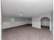 A spacious bonus room featuring neutral carpeting, fresh paint, and ample natural light at 6350 Mozart Dr, Riverdale, GA 30296