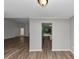 Spacious living room leading to kitchen and Gathering room, great for entertaining at 6350 Mozart Dr, Riverdale, GA 30296