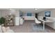 Staged living room showcasing updated wall colors and carpeting at 6350 Mozart Dr, Riverdale, GA 30296