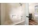 Bright bathroom featuring a tub/shower combo and modern finishes at 1489 Kolb Ridge Sw Dr, Marietta, GA 30008