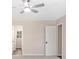 This bedroom boasts neutral walls and carpet, complemented by a modern ceiling fan and natural light at 1489 Kolb Ridge Sw Dr, Marietta, GA 30008