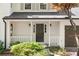 Inviting front entry featuring a covered porch and a charming front door at 1489 Kolb Ridge Sw Dr, Marietta, GA 30008