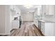 Well-lit kitchen featuring updated white cabinetry and stainless steel appliances at 1489 Kolb Ridge Sw Dr, Marietta, GA 30008