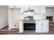 Modern kitchen with stainless steel appliances and white subway tile backsplash at 1489 Kolb Ridge Sw Dr, Marietta, GA 30008