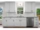 Kitchen featuring stainless steel dishwasher and granite countertops at 1489 Kolb Ridge Sw Dr, Marietta, GA 30008