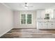 Open-concept living room with hardwood floors and view into the kitchen at 1489 Kolb Ridge Sw Dr, Marietta, GA 30008