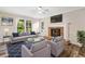 Comfortable living room with stylish furniture and a brick fireplace at 1489 Kolb Ridge Sw Dr, Marietta, GA 30008