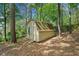 Wooden shed in a wooded backyard at 1489 Kolb Ridge Sw Dr, Marietta, GA 30008