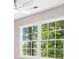 The window offers natural sunlight and a glimpse of the trees in this room at 1489 Kolb Ridge Sw Dr, Marietta, GA 30008