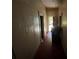View of a hallway with peeling paint and a garbage can at 158 Milton Sw Ave, Atlanta, GA 30314