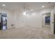 Bright bedroom with neutral carpet, closet, and adjacent doorways at 210 Little River Farms Trl, Canton, GA 30115