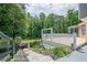 View from steps going up to the back deck with backyard in view at 210 Little River Farms Trl, Canton, GA 30115