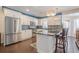 Modern kitchen with stainless steel appliances, black countertops and stylish backsplash at 210 Little River Farms Trl, Canton, GA 30115