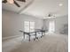 Spacious recreation room with ping pong table and multiple windows at 210 Little River Farms Trl, Canton, GA 30115