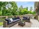 Relaxing outdoor deck with comfortable seating, perfect for entertaining and enjoying the serene views at 2343 Poplar Springs Ne Dr, Brookhaven, GA 30319
