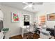 Bright home office featuring a modern desk, a printer and ample storage space at 2343 Poplar Springs Ne Dr, Brookhaven, GA 30319