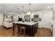 Stylish kitchen island featuring modern appliances, ample counter space, and a seamless transition to the living area at 2343 Poplar Springs Ne Dr, Brookhaven, GA 30319