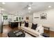 Open concept living area featuring hardwood floors, a modern kitchen, and ample space for comfortable living at 2343 Poplar Springs Ne Dr, Brookhaven, GA 30319
