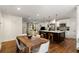 Open concept kitchen and dining area flowing into a living space, perfect for entertaining and Gathering gatherings at 2343 Poplar Springs Ne Dr, Brookhaven, GA 30319