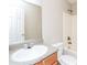 Bathroom with ample vanity space and a shower-tub combination at 2743 High Tide Dr, Atlanta, GA 30349