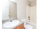 Bathroom featuring a single sink vanity and combination shower and tub at 2743 High Tide Dr, Atlanta, GA 30349