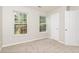 Bedroom featuring neutral paint and carpeting with natural light at 2743 High Tide Dr, Atlanta, GA 30349