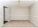 Classic dining room area with decorative chair railing, neutral paint, carpet, and chandelier lighting at 2743 High Tide Dr, Atlanta, GA 30349