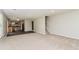 Open concept living room with kitchen access and staircase at 2743 High Tide Dr, Atlanta, GA 30349