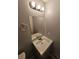 Clean bathroom featuring a mirror, vanity, and good lighting at 2860 Cocklebur Cove Ct, Decatur, GA 30034