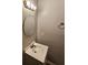 Bathroom featuring a white vanity, round mirror, and modern lighting at 2860 Cocklebur Cove Ct, Decatur, GA 30034