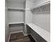 Spacious closet featuring shelving and hardwood floors at 2860 Cocklebur Cove Ct, Decatur, GA 30034