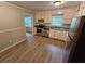 Well-lit kitchen with stainless steel appliances and ample cabinet space at 2860 Cocklebur Cove Ct, Decatur, GA 30034