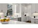 Bright modern kitchen with stainless steel appliances and quartz countertops at 1260 Heards Ferry Rd, Sandy Springs, GA 30328