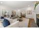 Spacious living room with hardwood floors, neutral colors and open access to dining room at 1260 Heards Ferry Rd, Sandy Springs, GA 30328