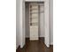 Spacious walk-in closet featuring custom shelving and drawer system at 1260 Heards Ferry Rd, Sandy Springs, GA 30328