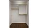 Walk-in closet with custom shelving and ample storage space at 1260 Heards Ferry Rd, Sandy Springs, GA 30328