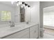 Bright bathroom features double vanity, marble countertops, and glass enclosed shower at 1620 Concord Meadows Dr, Smyrna, GA 30082