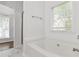 Bright bathroom showcases garden tub, tile floors, and walk-in shower at 1620 Concord Meadows Dr, Smyrna, GA 30082