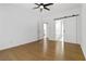 Primary bedroom features hardwood floors, ceiling fan, and ensuite bathroom with barn door at 1620 Concord Meadows Dr, Smyrna, GA 30082