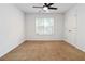 Clean bedroom with carpet, closet and ceiling fan at 1620 Concord Meadows Dr, Smyrna, GA 30082