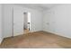 Neutral carpet, light walls and a walk-in closet provide style at 1620 Concord Meadows Dr, Smyrna, GA 30082