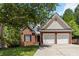 Charming two-story brick home with a two-car garage and a well-manicured lawn at 1620 Concord Meadows Dr, Smyrna, GA 30082