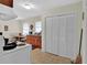 Functional kitchen featuring classic cabinets and ample counter space near a cozy dining area at 5868 Ash St, Forest Park, GA 30297