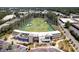 Wide aerial shot of the Topgolf facility with city views and many recreational opportunities available to homeowners at 2015 Liberty Nw Ct, Atlanta, GA 30318