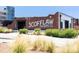 Scofflaw Brewing Co. featuring an industrial-style building with outdoor seating and landscaping at 2015 Liberty Nw Ct, Atlanta, GA 30318